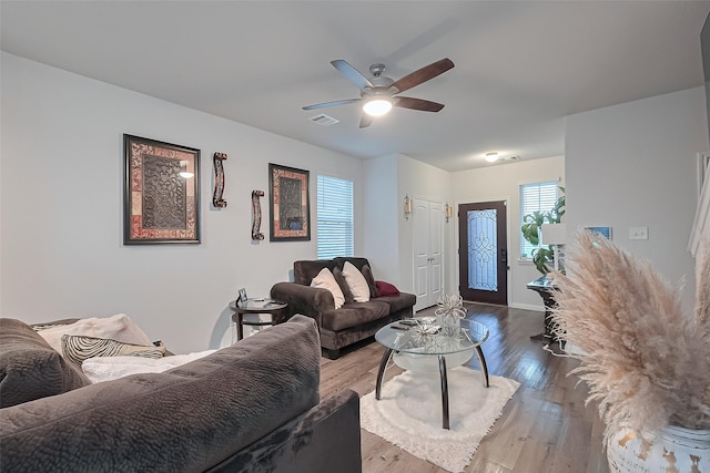 4807 Purple Wisteria Ln, Spring, TX 77373 - living area with a ceiling fan, wood finished floors, and baseboards