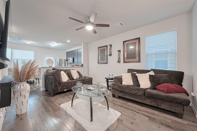 4807 Purple Wisteria Ln, Spring, TX 77373 - living room with a ceiling fan, light wood-style flooring, and recessed lighting
