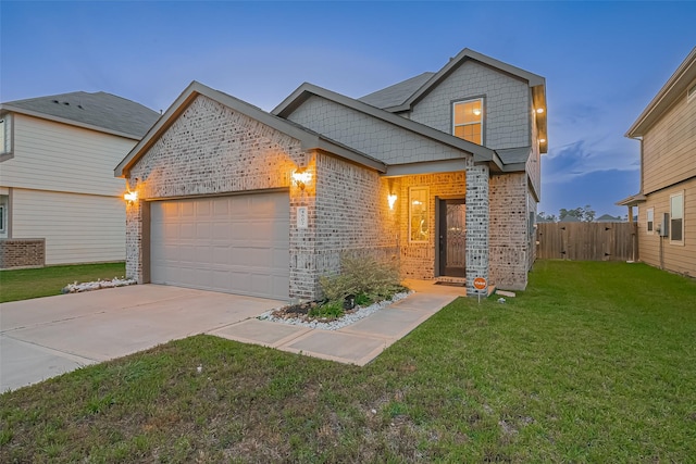 4807 Purple Wisteria Ln, Spring, TX 77373 - view of front of home featuring an attached garage, brick siding, and concrete driveway