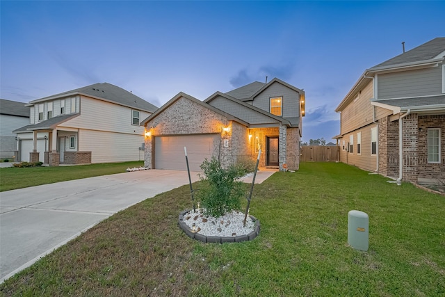 4807 Purple Wisteria Ln, Spring, TX 77373 - view of front of property with brick siding, driveway, and an attached garage