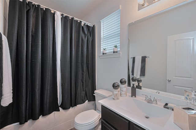 4807 Purple Wisteria Ln, Spring, TX 77373 - full bath featuring vanity, toilet, and shower / bath combo with shower curtain