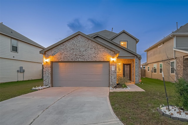 4807 Purple Wisteria Ln, Spring, TX 77373 - traditional home with brick siding, a garage, driveway, and a front lawn