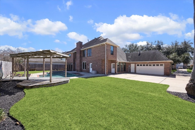 back of property with a fenced in pool, a pergola, a lawn, brick siding, and a fenced backyard