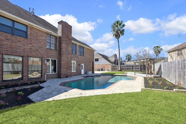 view of pool with a fenced in pool, a fenced backyard, a yard, and a patio area