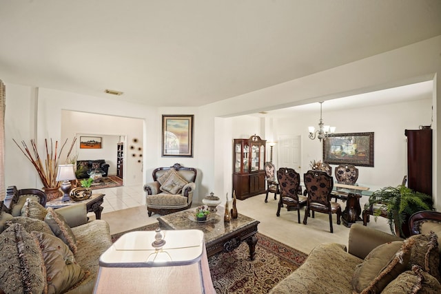 13823 Eldridge Garden Cir, Houston, TX 77083 - living room featuring light carpet, a notable chandelier, and visible vents
