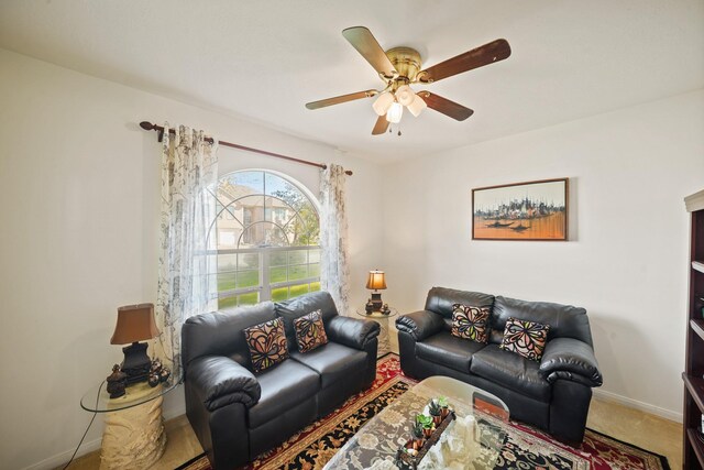 13823 Eldridge Garden Cir, Houston, TX 77083 - living room featuring baseboards and ceiling fan