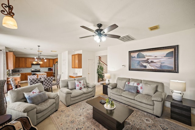 13823 Eldridge Garden Cir, Houston, TX 77083 - living room with visible vents and ceiling fan with notable chandelier
