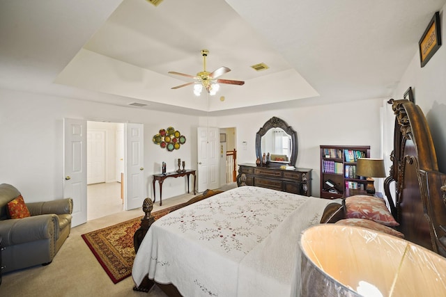 13823 Eldridge Garden Cir, Houston, TX 77083 - bedroom featuring carpet, a ceiling fan, visible vents, and a raised ceiling