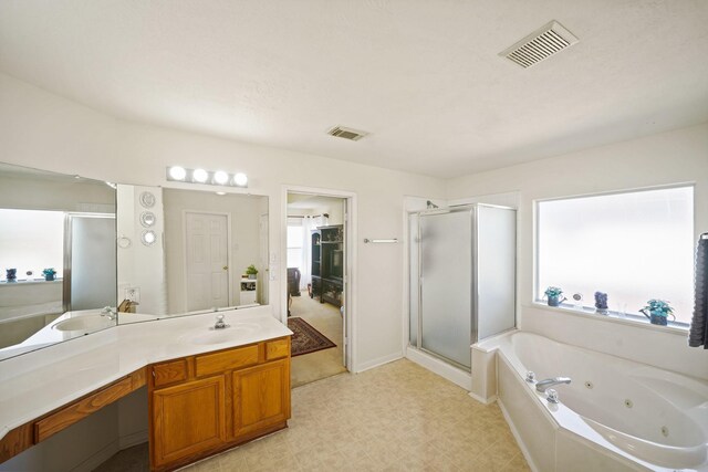 13823 Eldridge Garden Cir, Houston, TX 77083 - bathroom with a stall shower, a tub with jets, visible vents, and vanity