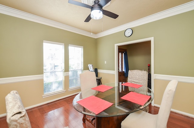 dining room with baseboards, ornamental molding, and a wealth of natural light