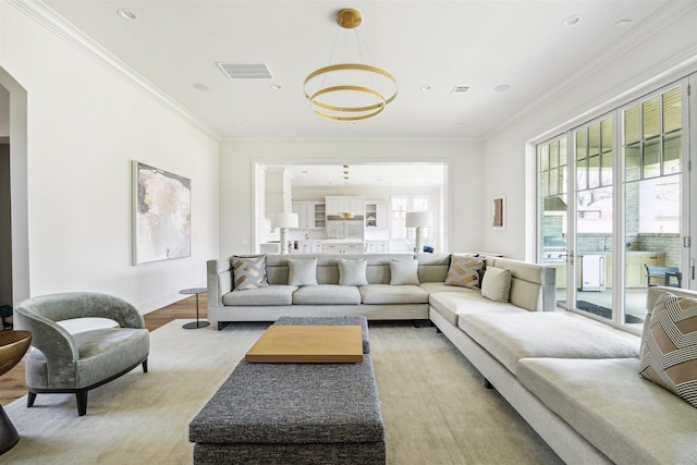 2023 Drexel Dr, Houston, TX 77027 - living area with visible vents, ornamental molding, and arched walkways