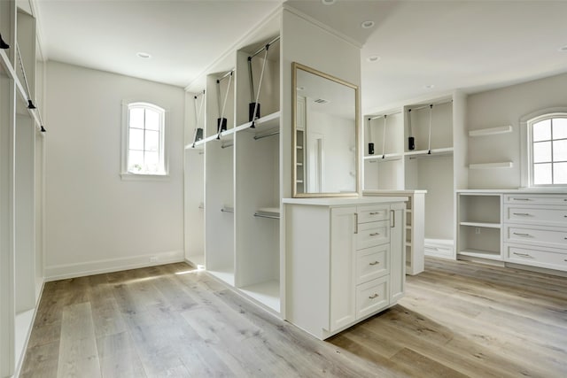 2023 Drexel Dr, Houston, TX 77027 - walk in closet featuring light wood finished floors