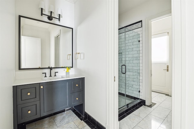 2023 Drexel Dr, Houston, TX 77027 - bathroom with marble finish floor, ornamental molding, vanity, baseboards, and a stall shower