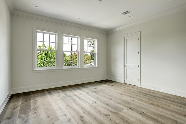 2023 Drexel Dr, Houston, TX 77027 - spare room featuring wood finished floors, visible vents, ornamental molding, and baseboards