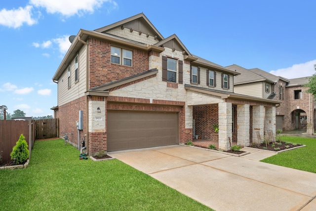view of front of house with a front yard, an attached garage, fence, and stone siding