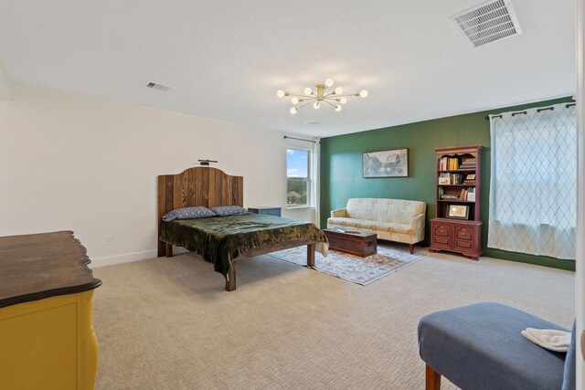 bedroom with baseboards, a notable chandelier, carpet flooring, and visible vents