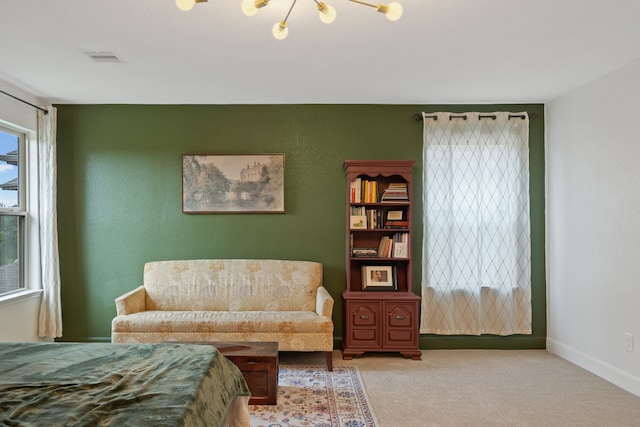 carpeted bedroom with baseboards and visible vents