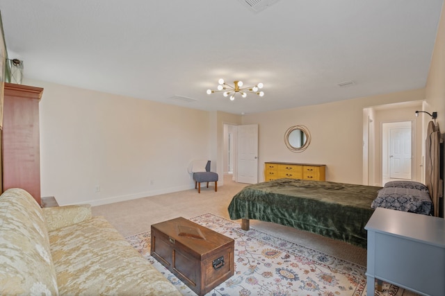 carpeted bedroom with an inviting chandelier, baseboards, and visible vents