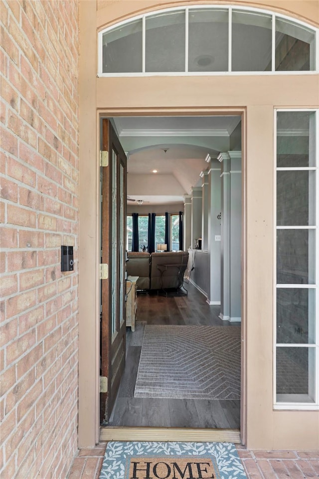 entrance to property with brick siding