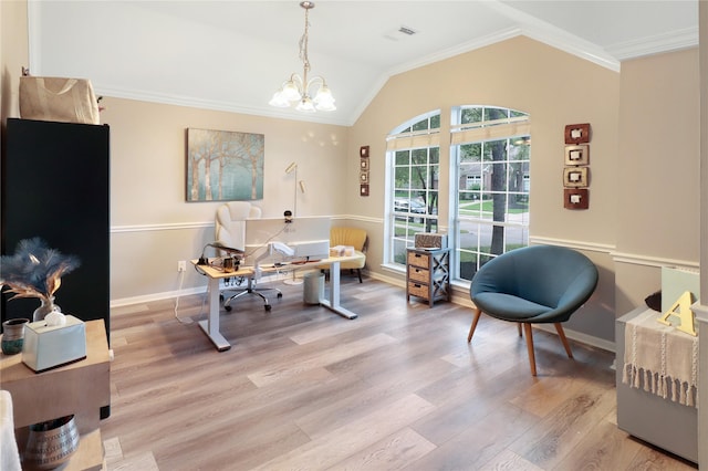office area featuring light wood finished floors, a notable chandelier, visible vents, vaulted ceiling, and ornamental molding