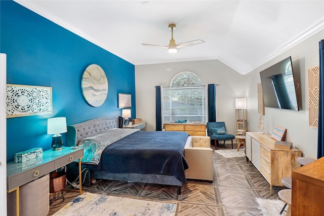 bedroom featuring ceiling fan, crown molding, and vaulted ceiling