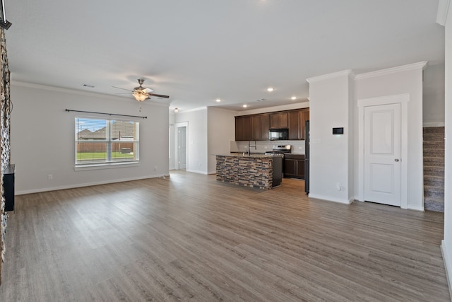 unfurnished living room featuring crown molding, a ceiling fan, recessed lighting, and light wood-style floors