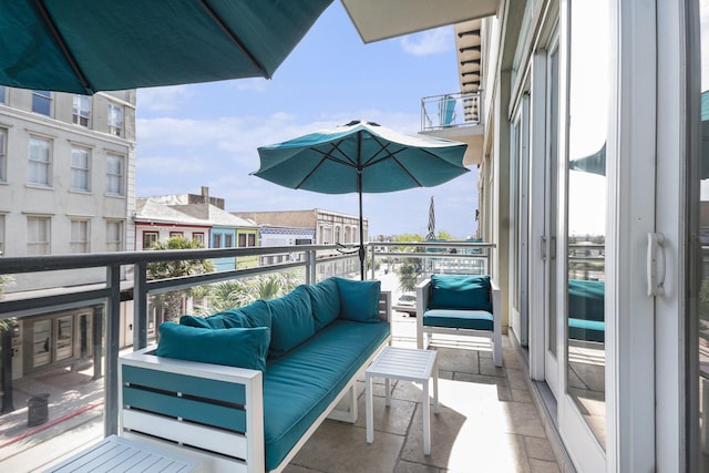 balcony with an outdoor hangout area