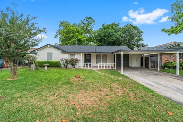 9231 Rockcliff Dr, Houston, TX 77037 - ranch-style house with a front yard, an attached carport, covered porch, and driveway