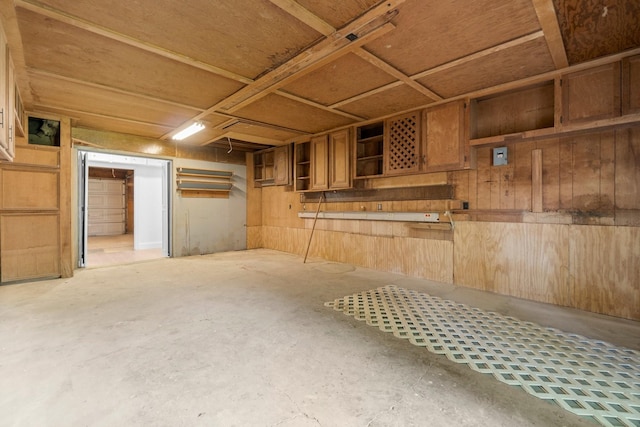 9231 Rockcliff Dr, Houston, TX 77037 - below grade area featuring wooden walls