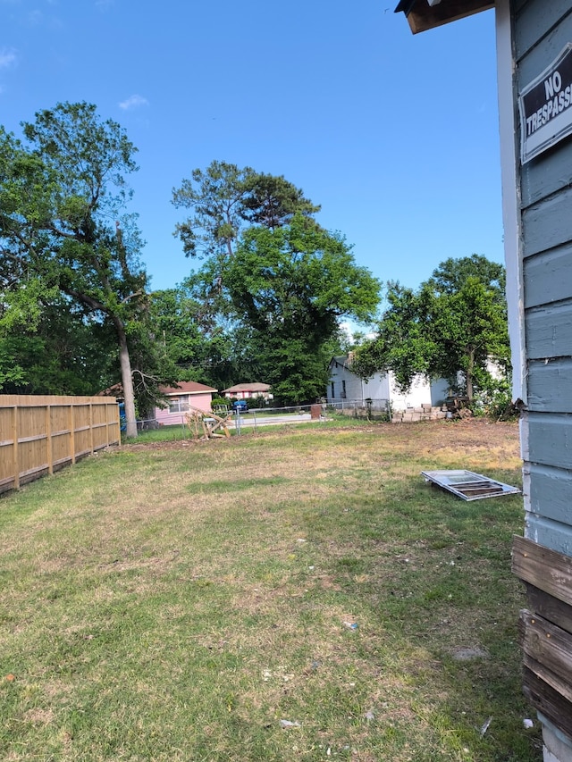 view of yard with fence