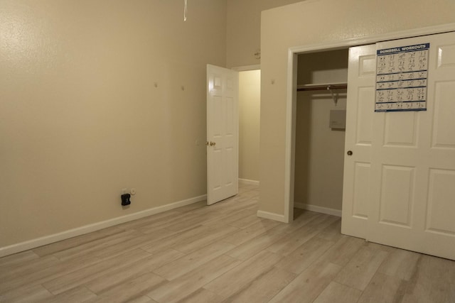 1527 Carbonear Dr, Channelview, TX 77530 - unfurnished bedroom with light wood-style floors, a closet, and baseboards