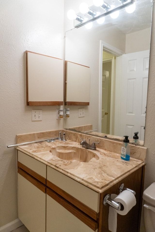 1527 Carbonear Dr, Channelview, TX 77530 - half bath with toilet, a textured wall, and vanity
