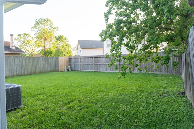 1527 Carbonear Dr, Channelview, TX 77530 - view of yard with cooling unit and a fenced backyard