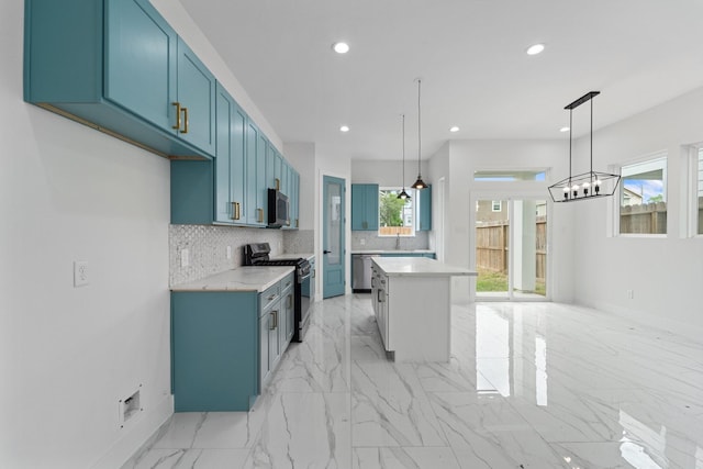kitchen with recessed lighting, stainless steel appliances, a center island, marble finish floor, and backsplash