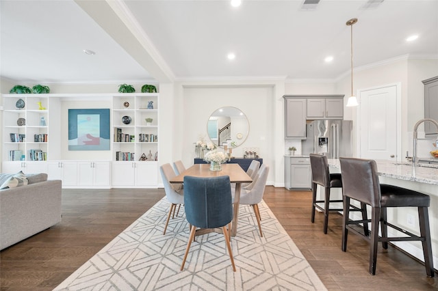 1705 Red Oak Point Dr, Houston, TX 77055 - dining area featuring crown molding, dark wood finished floors, and recessed lighting