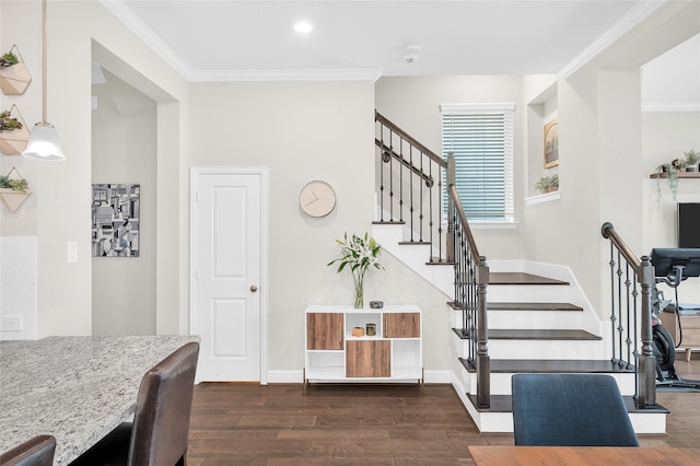 staircase featuring baseboards, recessed lighting, wood finished floors, and crown molding
