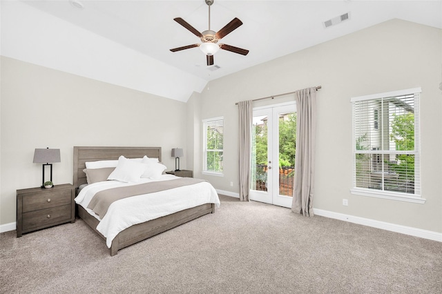1705 Red Oak Point Dr, Houston, TX 77055 - carpeted bedroom featuring vaulted ceiling, access to outside, multiple windows, and baseboards