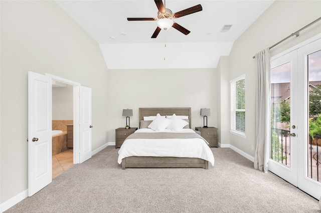 carpeted bedroom featuring access to exterior, ensuite bath, visible vents, and baseboards