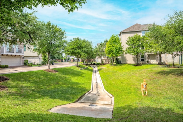 1705 Red Oak Point Dr, Houston, TX 77055 - view of home's community with a lawn
