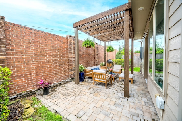 view of patio / terrace featuring outdoor lounge area, a fenced backyard, and a pergola
