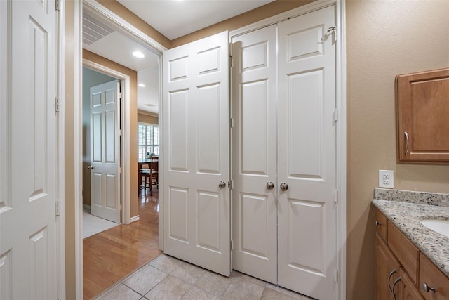 2400 Mccue Rd Unit 260, Houston, TX 77056 - bathroom featuring vanity, tile patterned floors, and recessed lighting