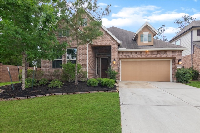 traditional-style home featuring concrete driveway, brick siding, a front lawn, and a garage