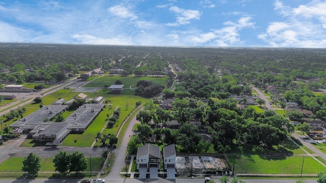 aerial view featuring a view of trees