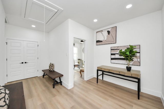 entryway with baseboards, recessed lighting, visible vents, and light wood-style flooring