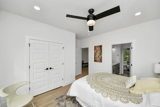 bedroom featuring recessed lighting, wood finished floors, ceiling fan, and a closet