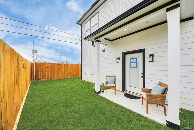 exterior space with a fenced backyard