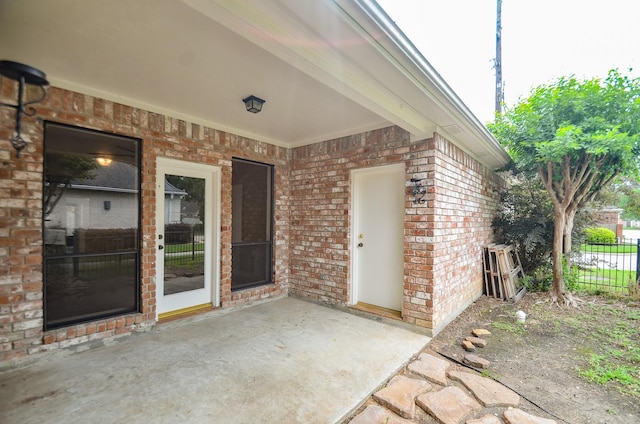 view of patio / terrace featuring fence