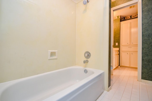full bath with tile patterned floors and baseboards