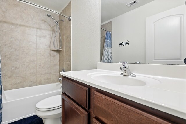 full bath featuring shower / bathtub combination with curtain, visible vents, toilet, and vanity
