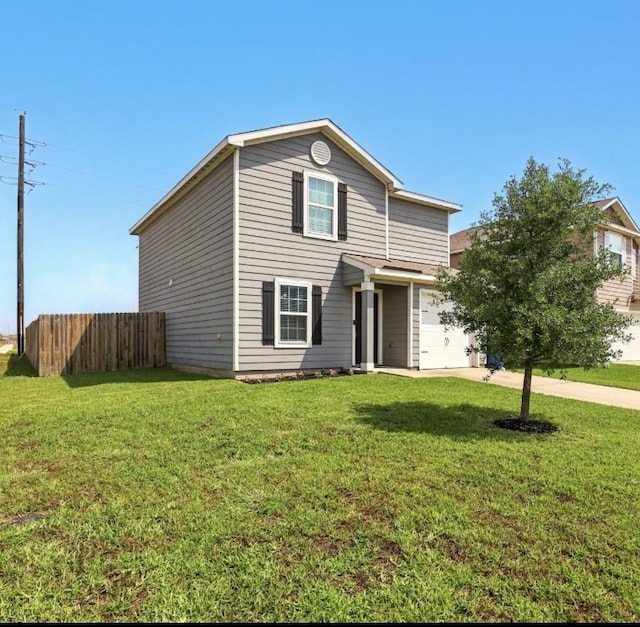 traditional-style house featuring fence, concrete driveway, and a front lawn